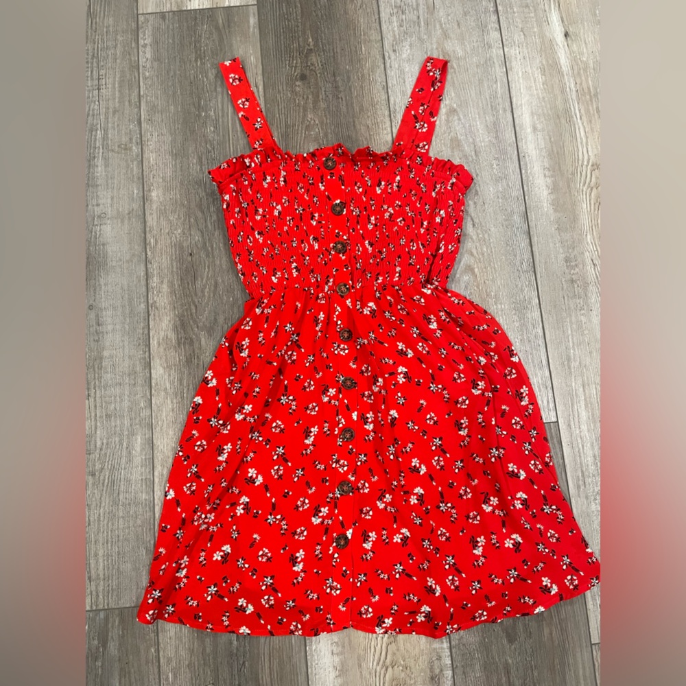 Red mini dress with flowers.